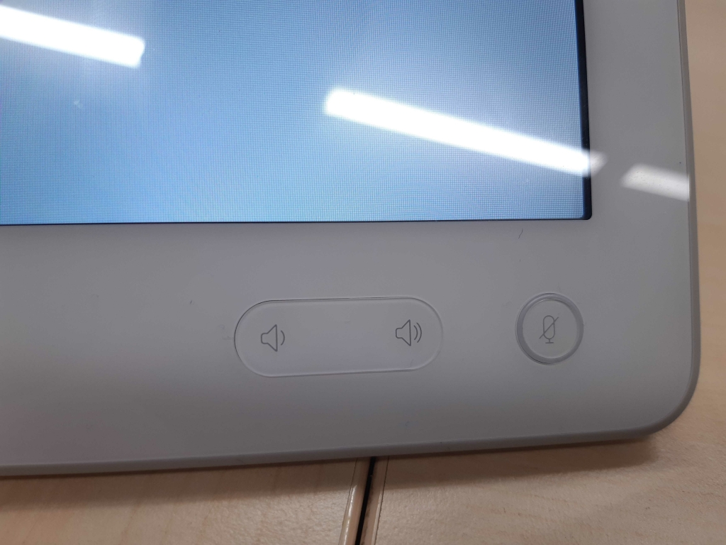 buttons on the touch panel for volume and muting in the bottom right corner