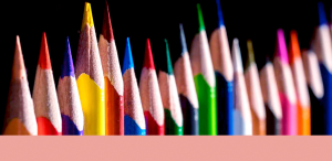 a row of coloured pencils