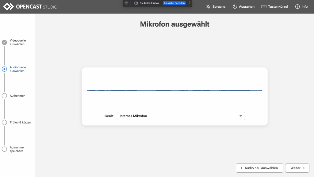 In Audioquelle auswählen erscheint ein Mikrofontest, der visuell Feedback dazu gibt, ob das Mikrofon funktioniert. Rechts unten sind zwei Buttons Audio neu auswählen und Weiter.