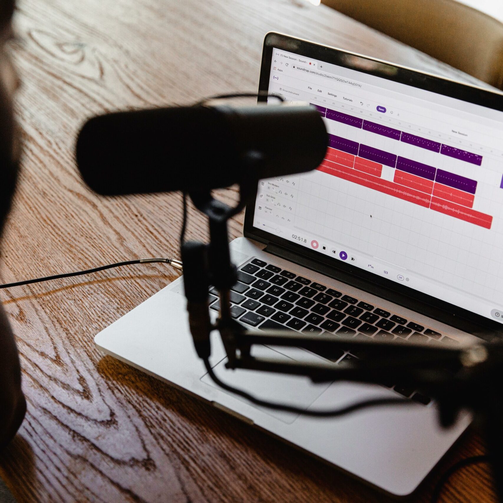 a laptop with a microphone in front of it